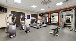 TVs, Cardio Equipment, and Weights in Fitness Center