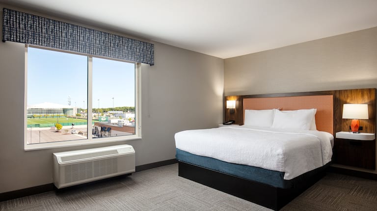 Large Bed in a Guest Room with Stadium View