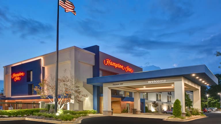 front exterior of building at dusk