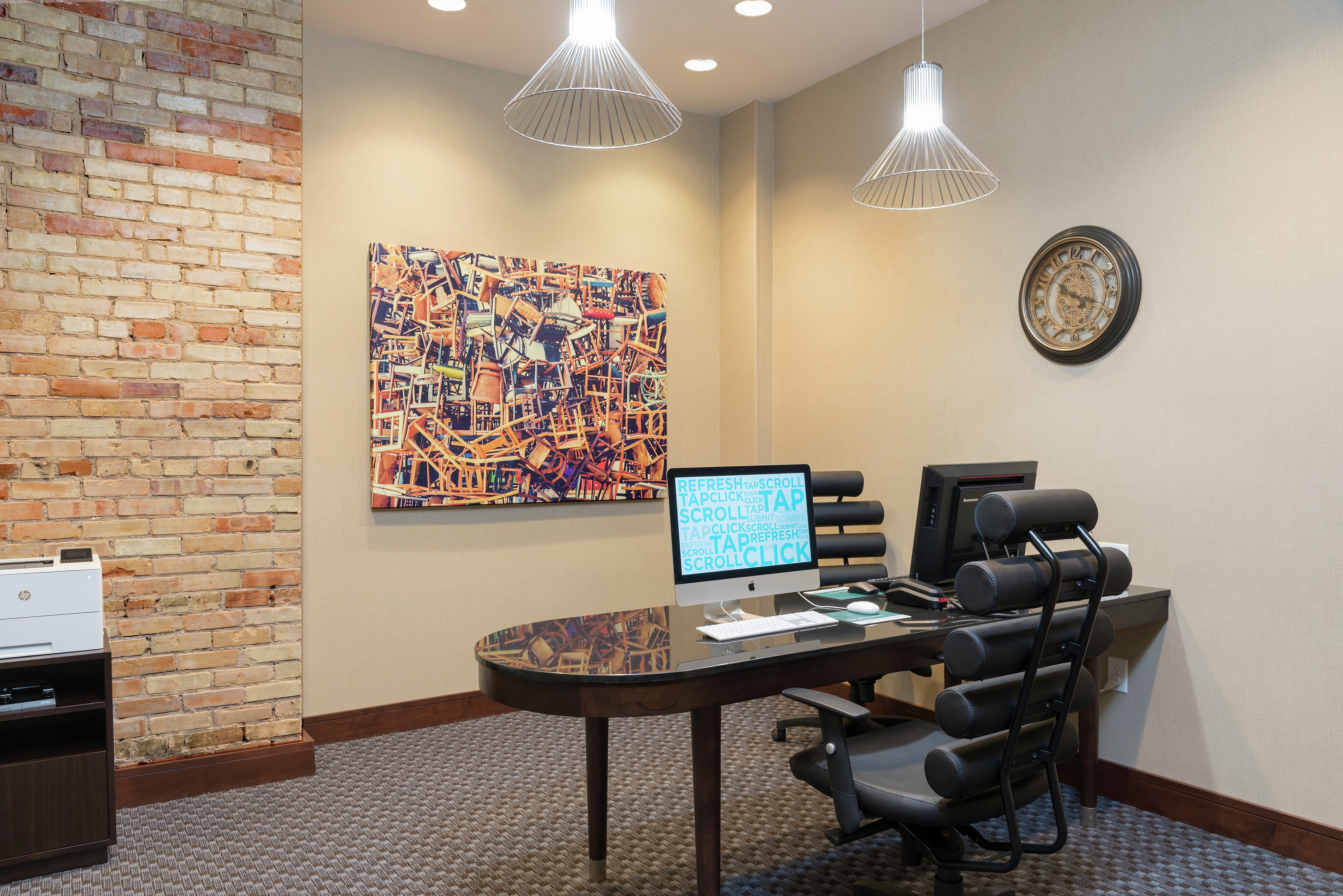 Business Center With Printer/Fax/Copier, Wall Art, Wall Clock, Two Computer on Desk, and Two Chairs