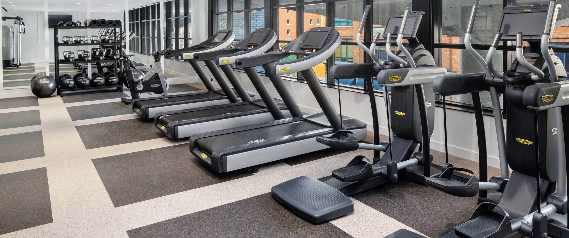 Treadmills Weights and Elliptical Machines in Fitness Center