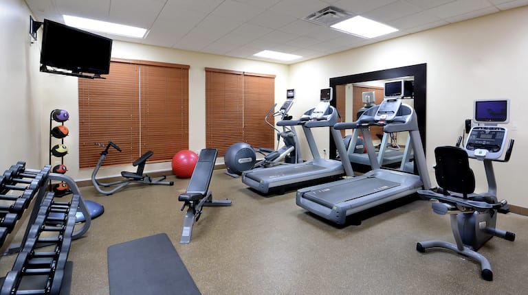 Fitness Center with Treadmills and Weigts