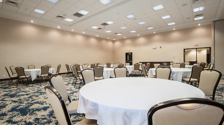 Spacious Ballroom Area with Roundtables