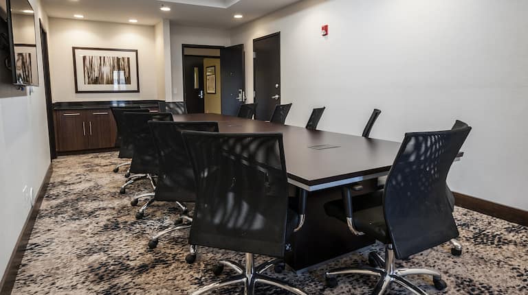 Boardroom Meeting Space with Table and Office Chairs
