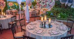Jardin Social Banquet with tables and chairs set for dinner