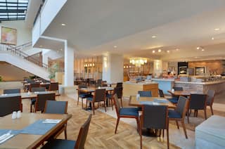 Restaurant Dining Area with Chairs and Tables