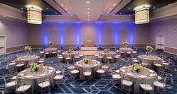 Ballroom with Linen Covered Tables and Floral Centerpieces