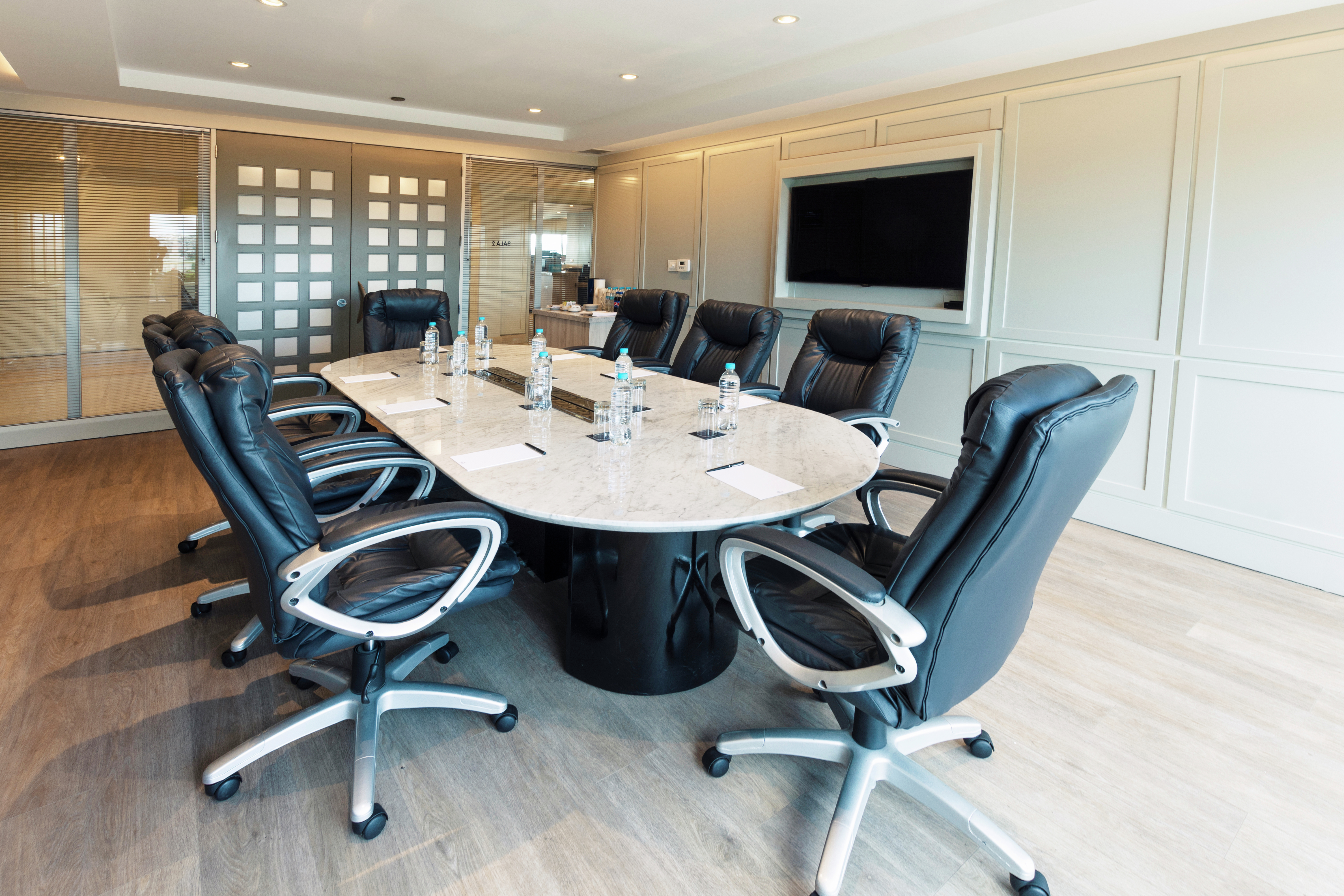 Boardroom with HDTV and Seating for 8 Guests