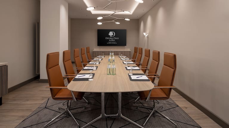 Boardroom with HDTV and Seating for Ten Guests