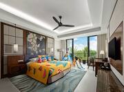 Kids room with King Bed, colourful bed sheets and view of outside