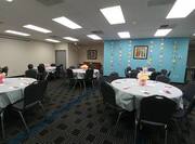 Meeting and Event Space with Round Table Setup 