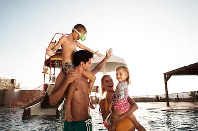 Family Having Fun at the Pool
