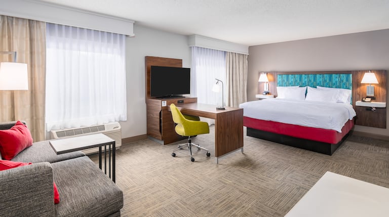 King Studio Suite with a Large Bed, Sofa, Desk and HDTV