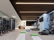 Fitness centre with free wights, treadmills and yoga mats
