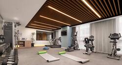 Fitness centre with treadmills, cycling machines, yoga mats and free weights