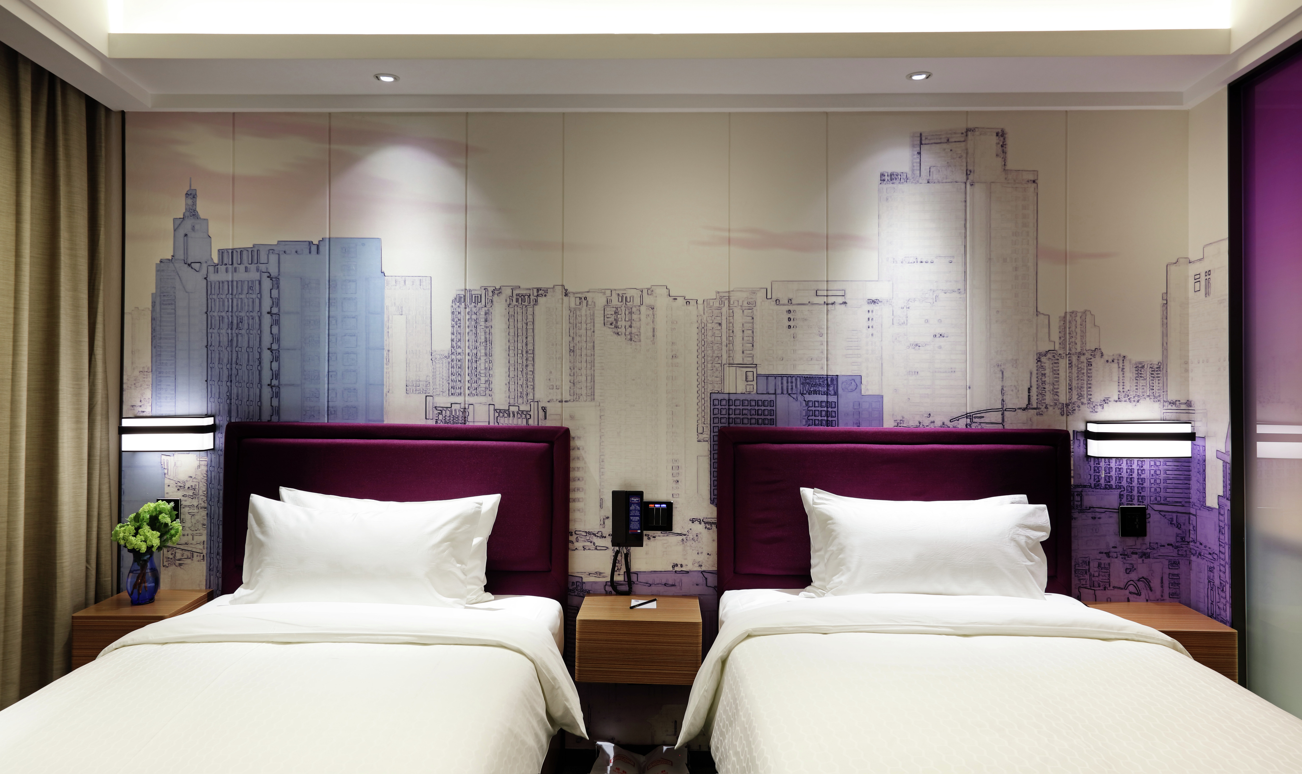 Two Twin Beds with Modern Wall Art