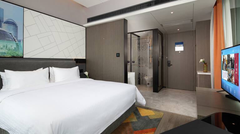 Chambre supérieure avec très grand lit