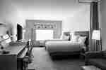 Double queen room with work desk and TV