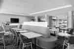 Lobby seating area with tables