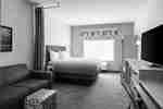 King suite with couch and TV