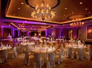 Ballroom with Banquet Style Setup and Elegant Lighting 