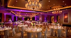 Ballroom with Banquet Style Setup and Elegant Lighting 