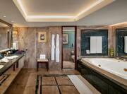 Dual Vanity Area and Bathtub of King Imperial Suite 