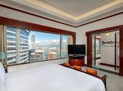 Bedroom of King Imperial Suite with City View