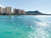 Surfers by Waikiki Beach / Hotel Exterior & Surrounding Buildings