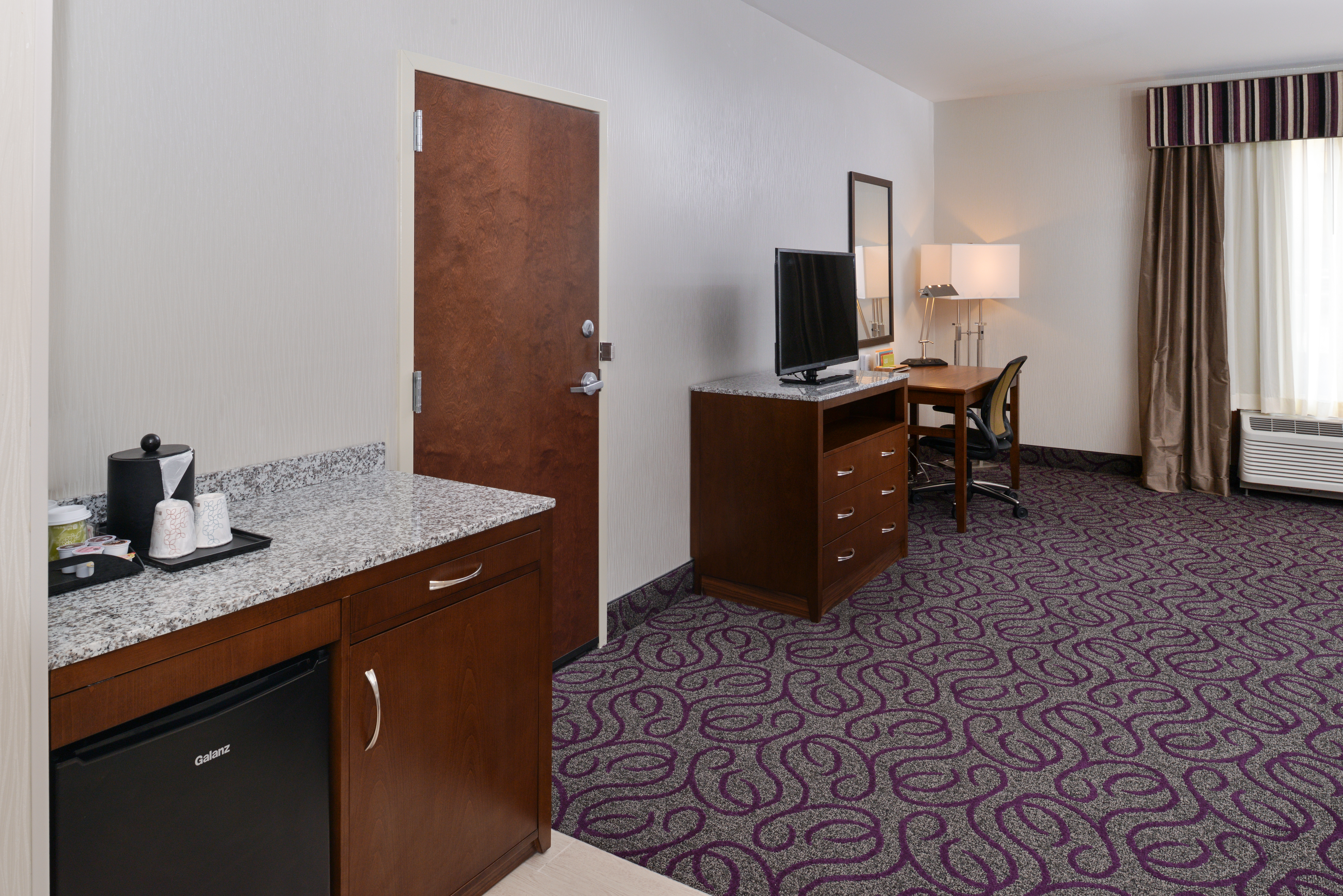 Accessible King Room Wet Bar Area with Mini Fridge, TV and Work Desk