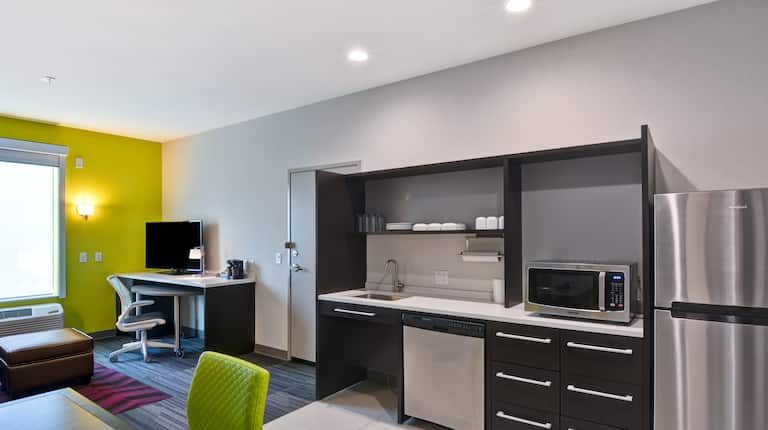Suite Kitchen with Refrigerator, Microwave, Sink and Dishwasher