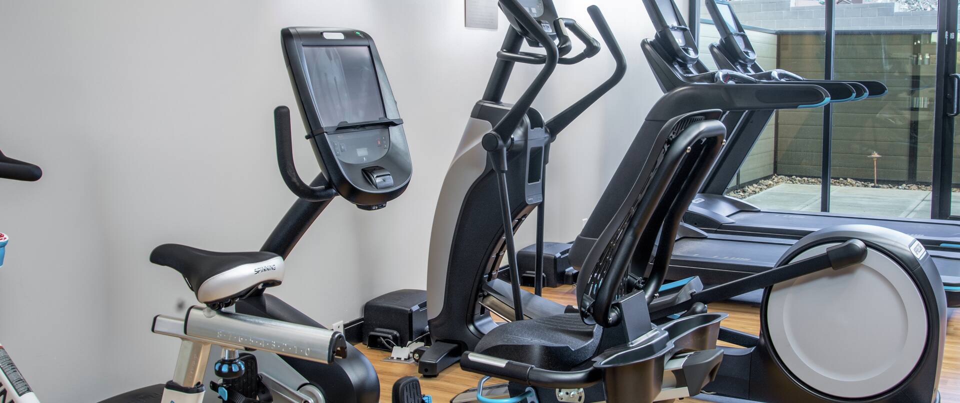 Fitness Center with Treadmills and Spinning Bikes