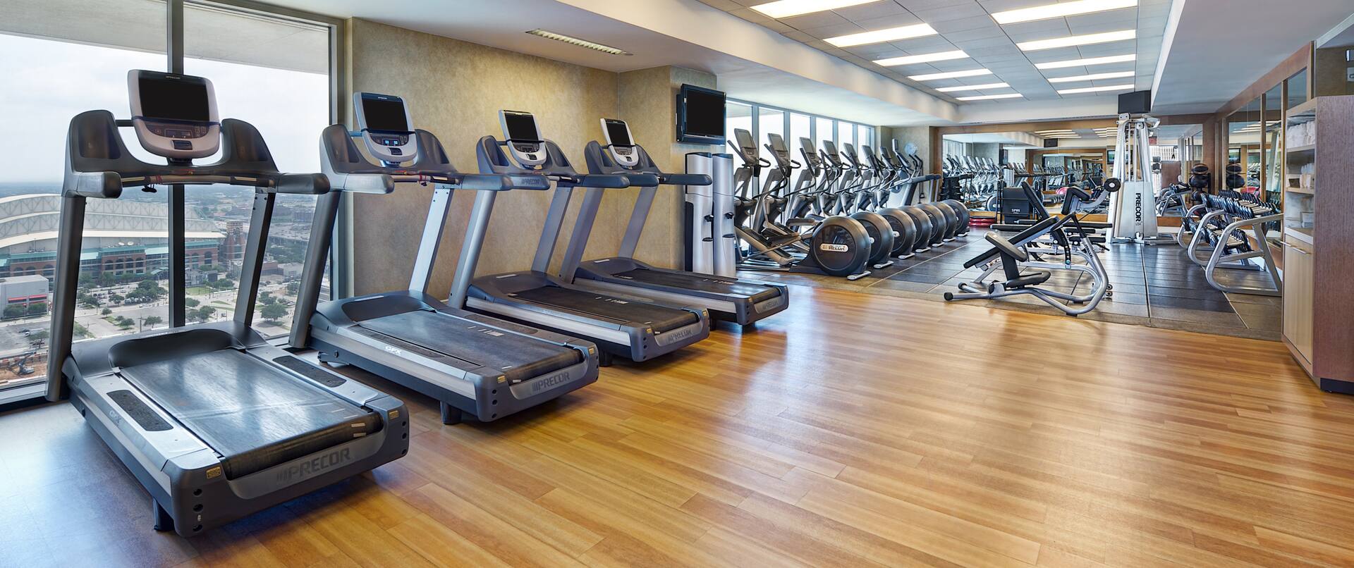Fitness Center with Treadmills and Cross-Trainer Machines