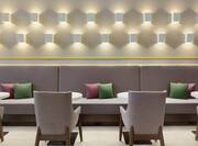 Bright hotel seating area featuring stylish and comfortable design. 