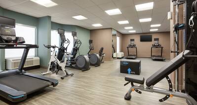 Convenient on-site fitness center fully stocked with cardio machines and exercise equipment.
