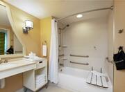 Mobility Accessible Bathroom with Bathtub and Seat