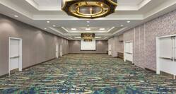 Spacious empty ballroom perfect for events and meetings.
