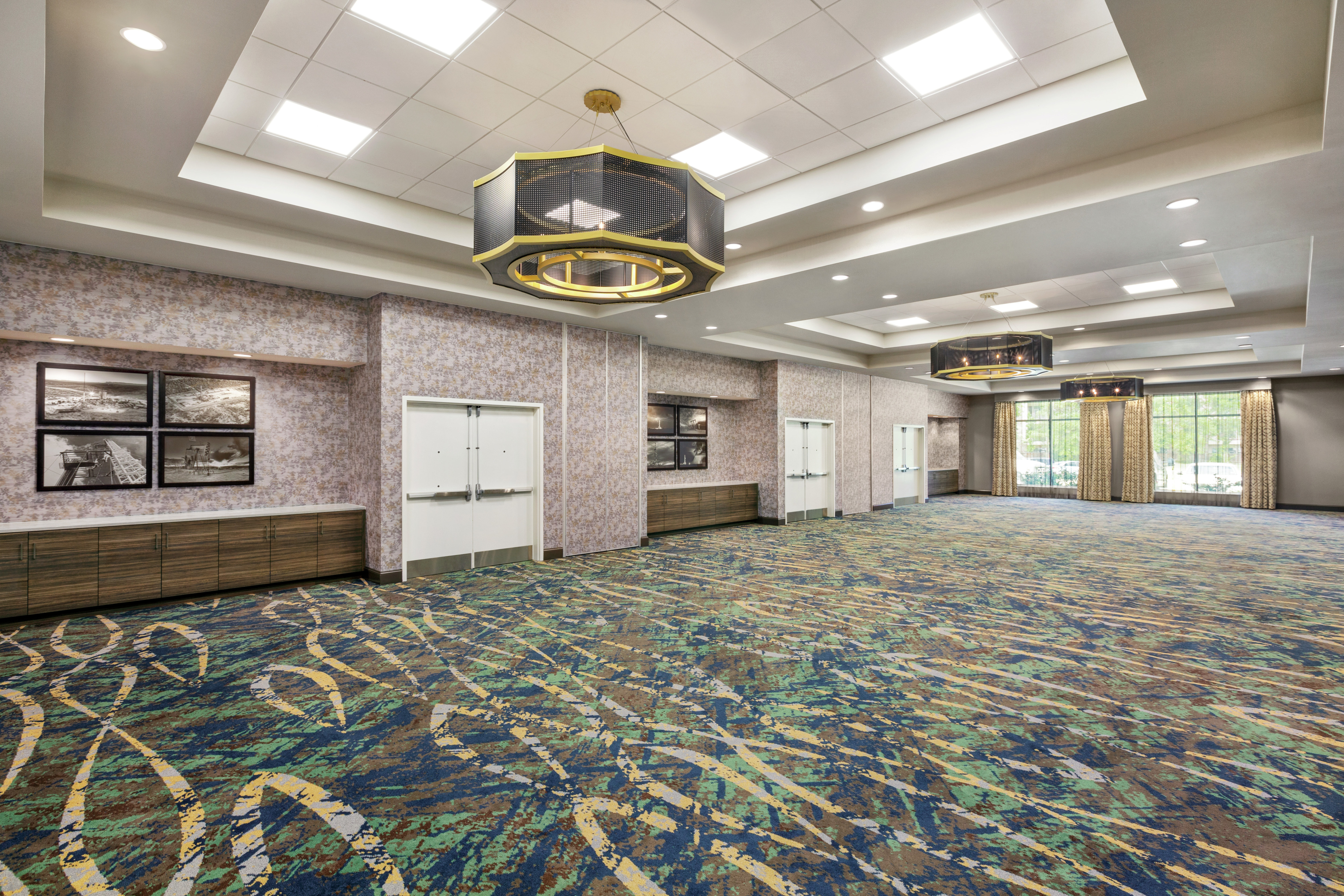 Spacious empty on-site ballroom perfect for events and meetings.