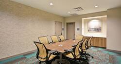 Meeting Room with Table and Chairs
