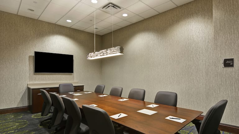 Seating for 10 atTable in Boardroom With TV