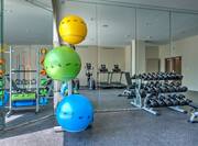 Fitness center with free weights and yoga balls