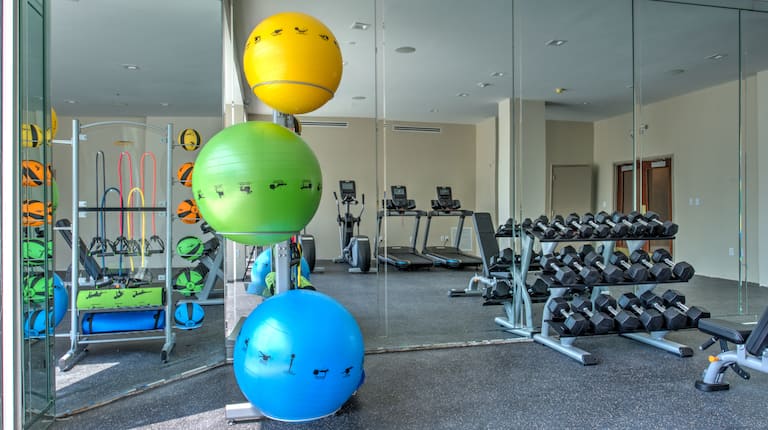 Fitness center with free weights and yoga balls