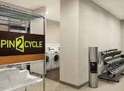 Convenient on site coin operated guest laundry alongside fully equipped fitness center.