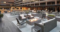 Rooftop patio with fire pit and seating
