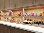 Convenient suite shop located in hotel lobby fully stocked with toiletries, snacks, and beverages.