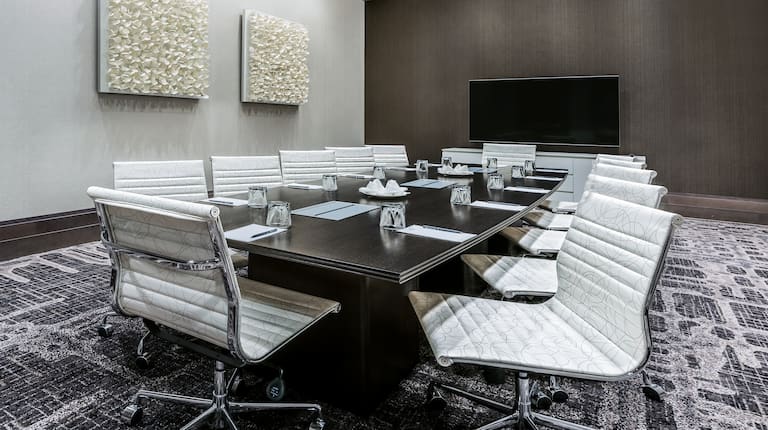Boardroom with Conference Table and Wall Mounted TV