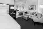 Suite with King Bed, Lounge Seating, Work Desk and Wet Bar Kitchen