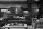 Comfortable seating area in lobby with table and chairs