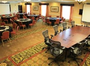 Boardroom and Round Table  Seating in Ballroom With Two Presentation Screens