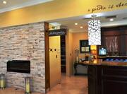 Front Desk Reception Area with Fireplace